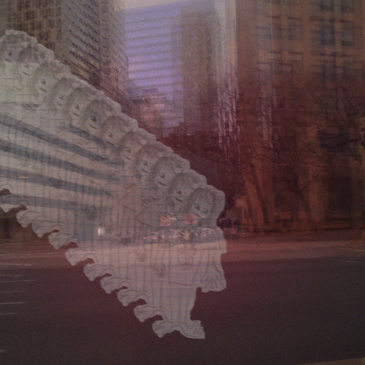 Glitched out person with picture of Chicago streets...which are also glichted out